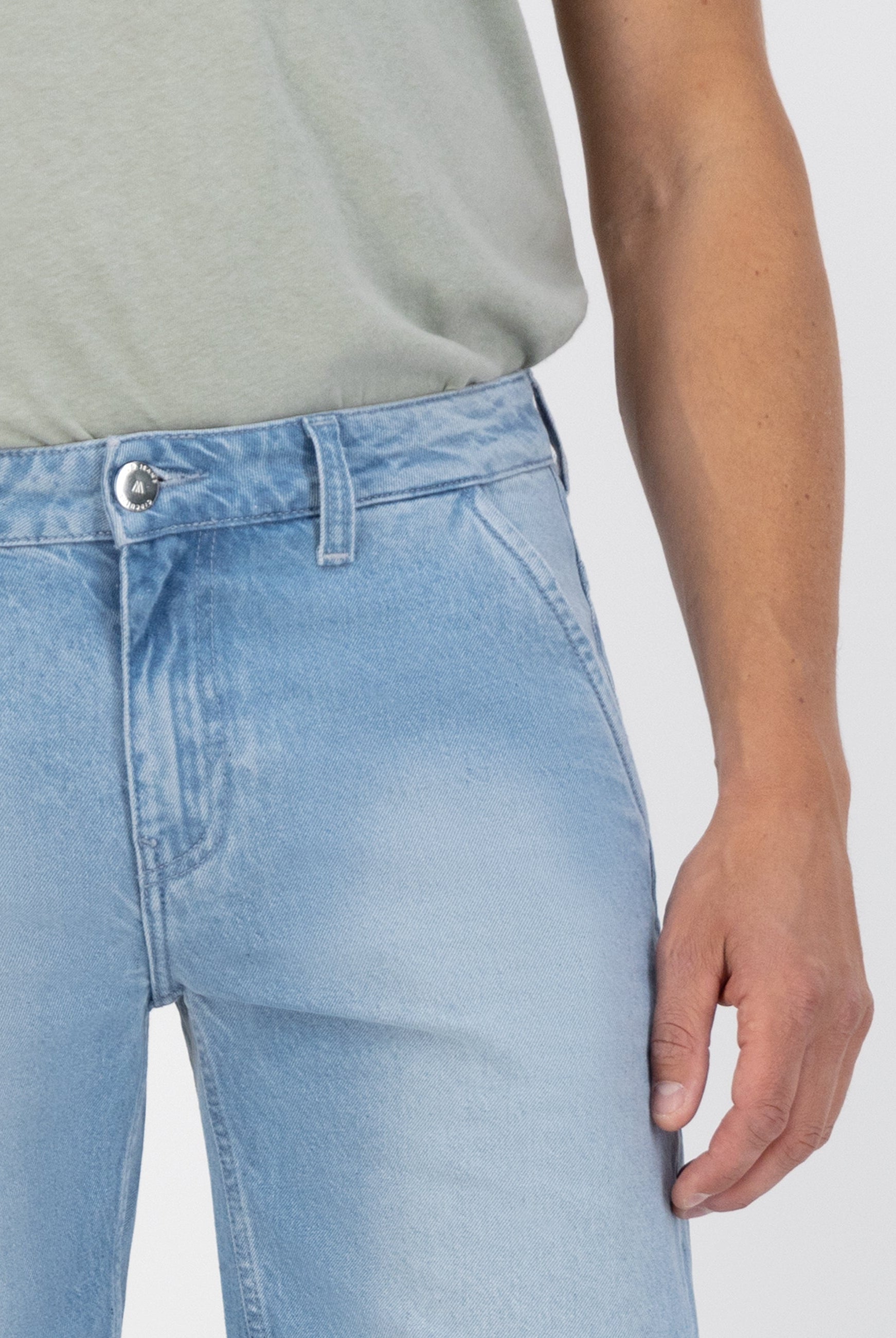Sustainable MUD Jeans shorts crafted from light blue denim, showcasing an ethical, eco-friendly design for casual wear.