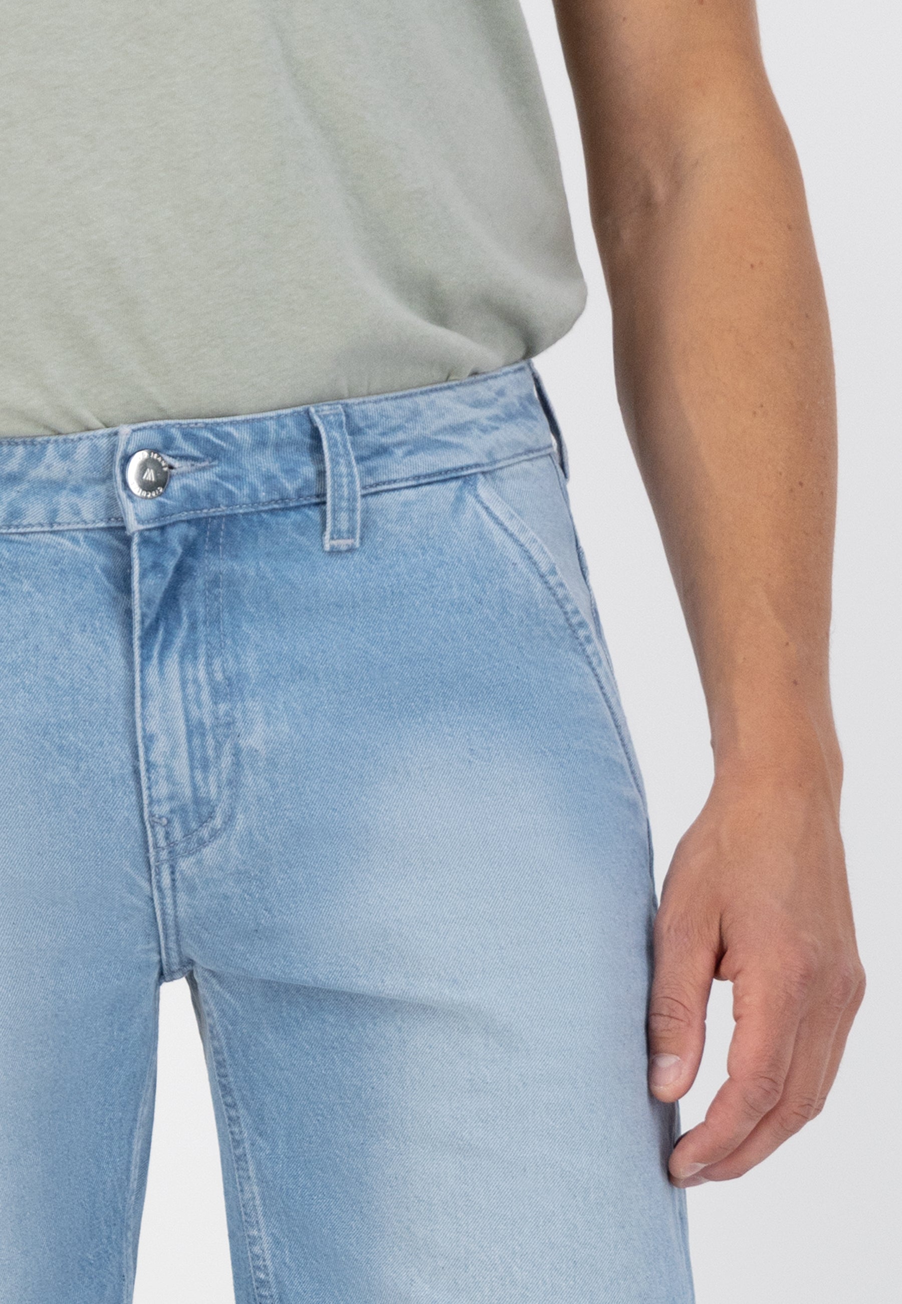 Sustainable MUD Jeans shorts crafted from light blue denim, showcasing an ethical, eco-friendly design for casual wear.