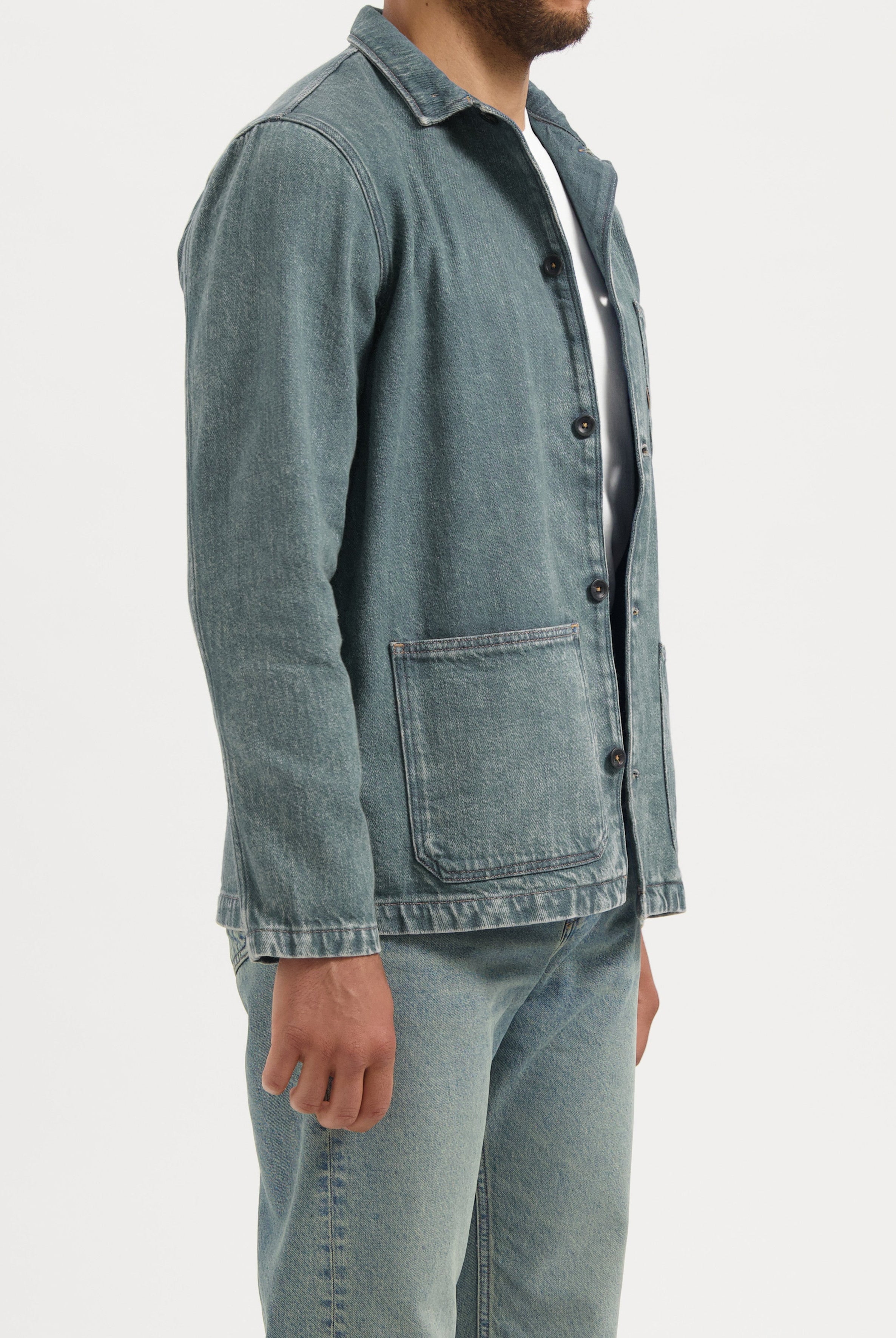 Sustainable MUD Jeans in light blue denim, crafted from organic cotton, showcasing a classic fit from the back.