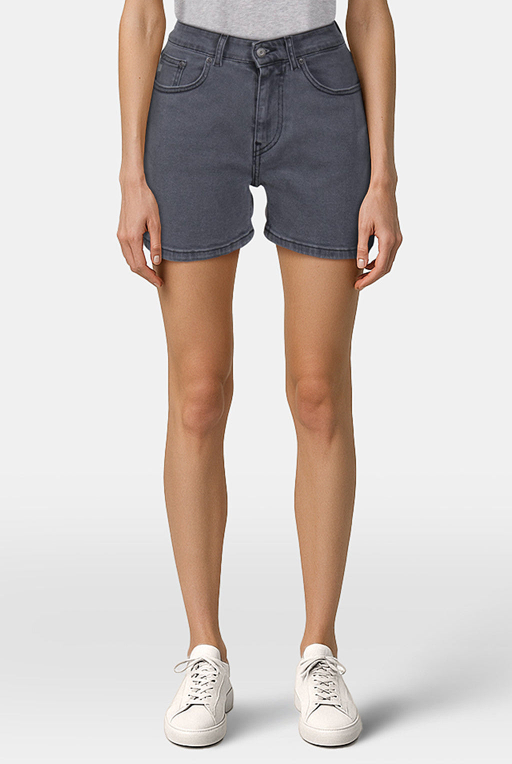 High-waisted gray denim shorts, featuring a tailored fit, paired with a casual gray top and white sneakers for a stylish look.