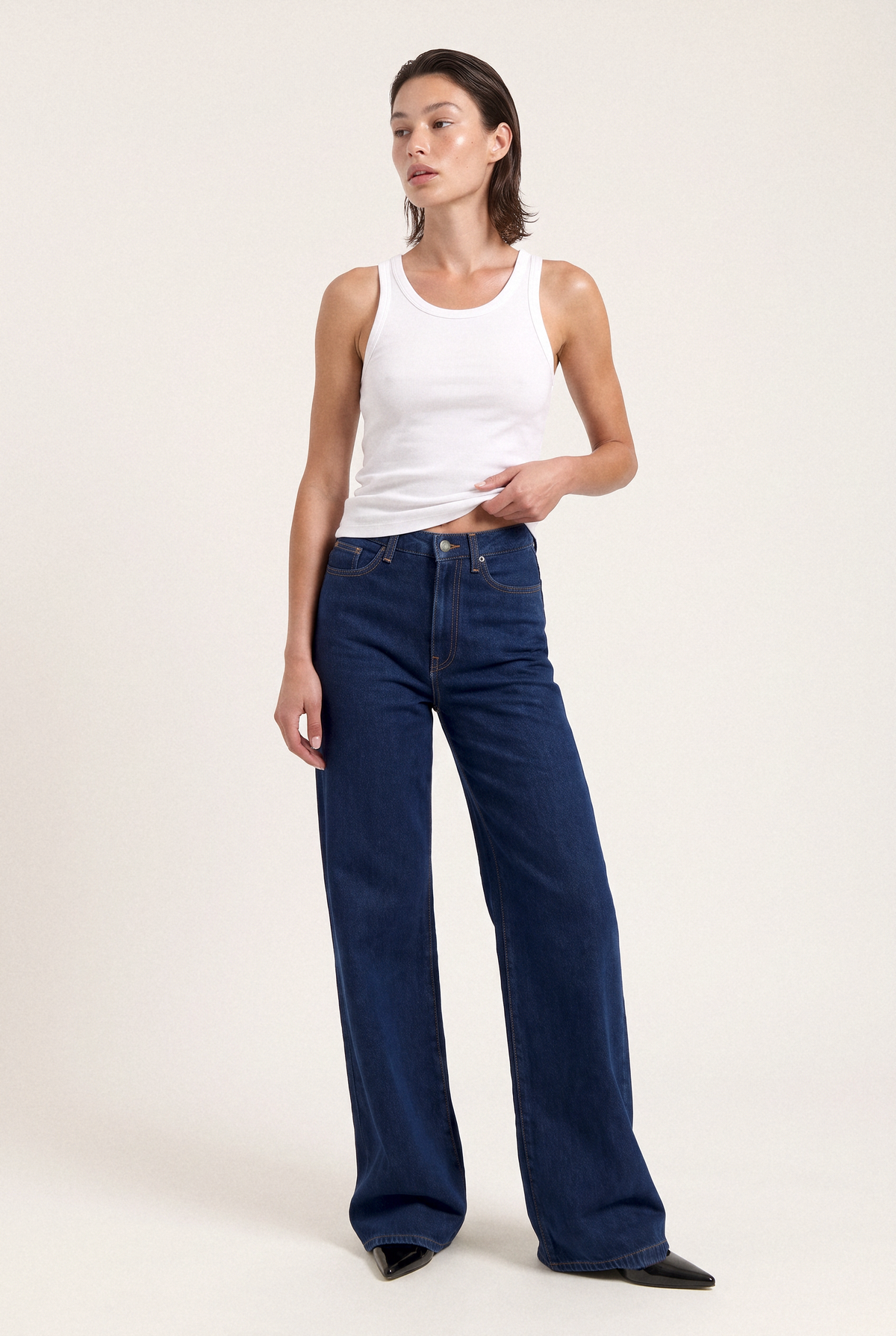 Sara High Loose Stone Indigo - front lifted top