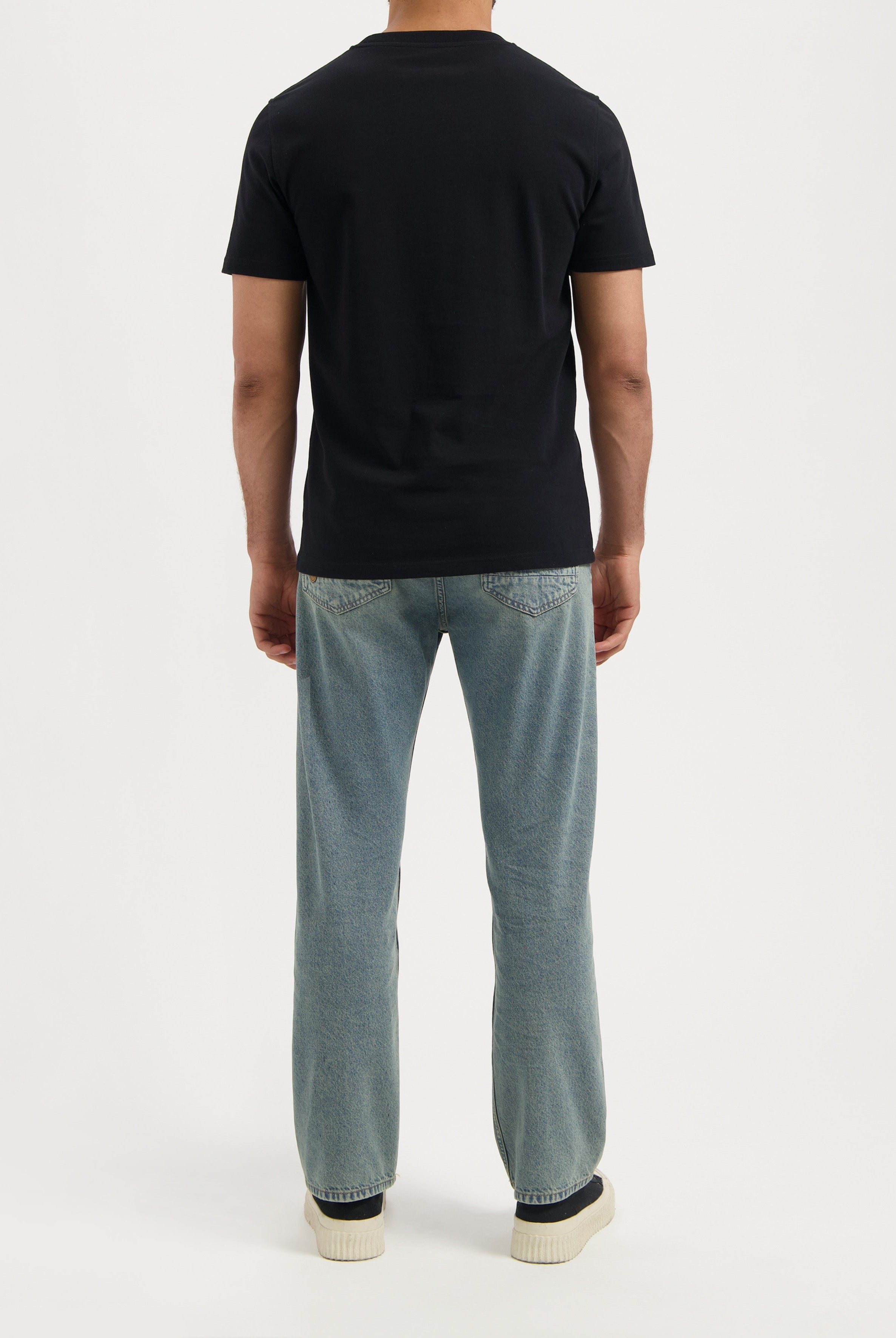 Sustainable MUD Jeans jacket in deep blue denim, highlighting ethical fashion with buttoned high collar and sleek design.