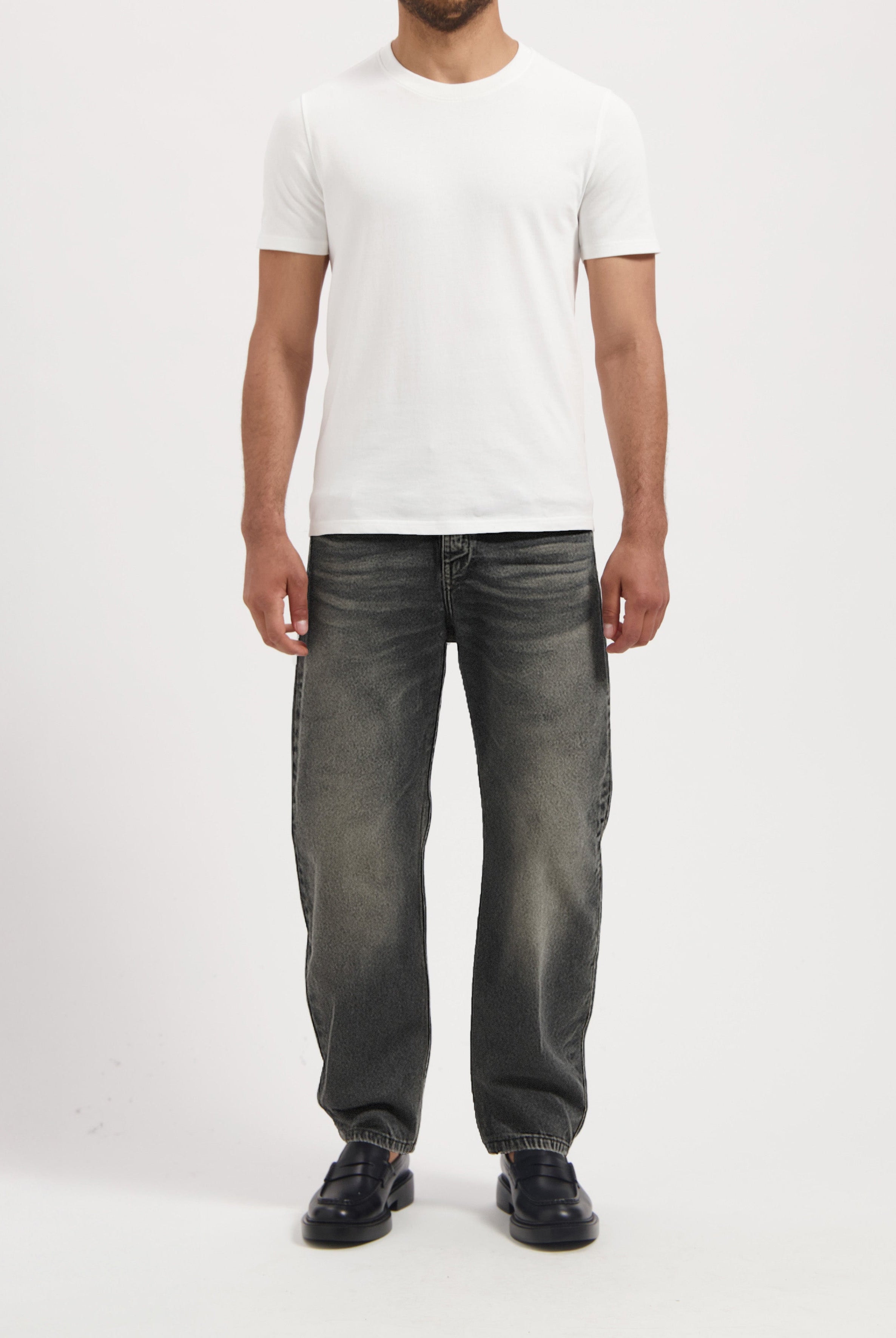 Sustainable MUD Jeans in deep blue denim, featuring ethical craftsmanship with signature pocket stitching detail.