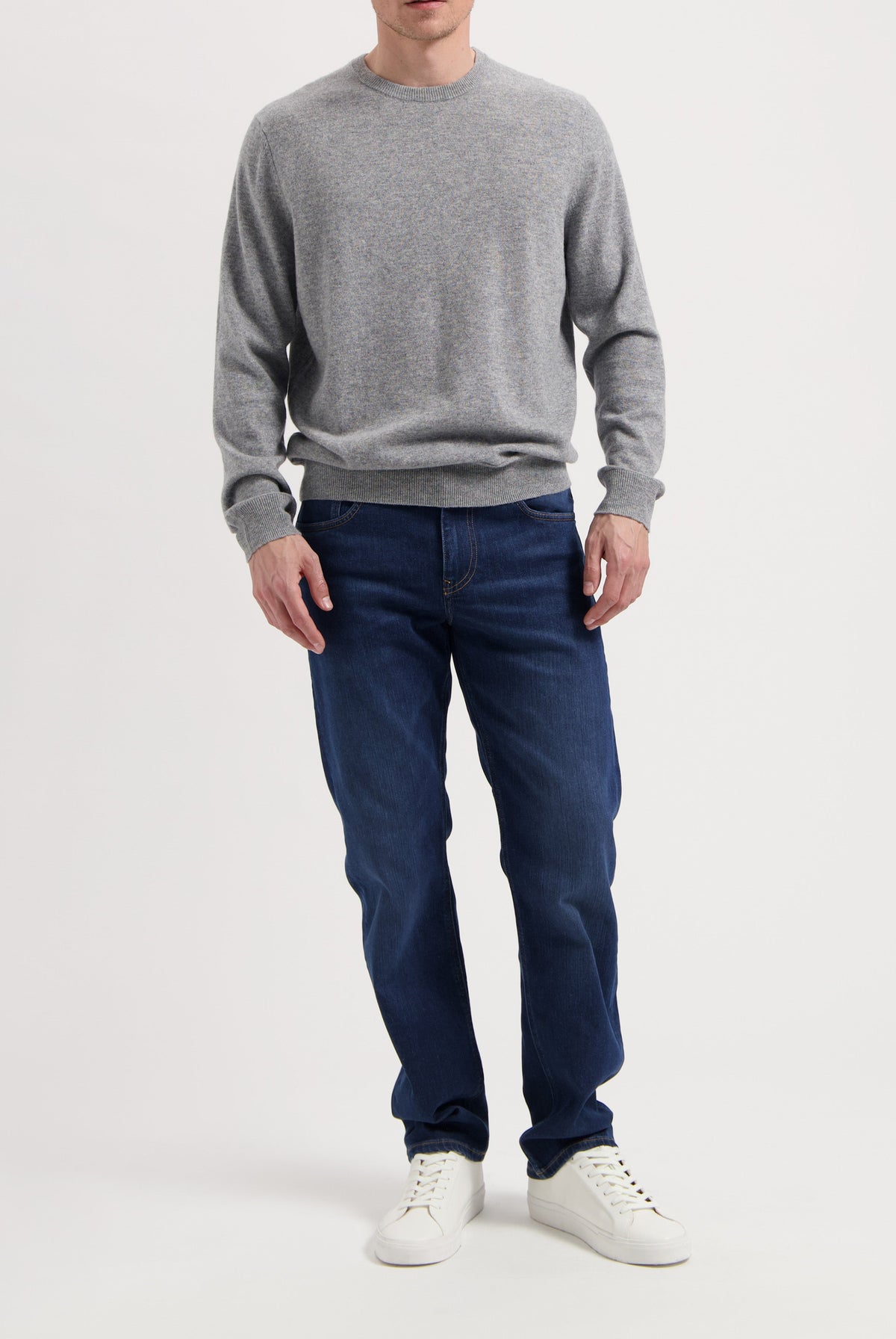 Sustainable MUD Jeans in slate blue, crafted from ethical materials, showcasing classic fit and comfortable style.