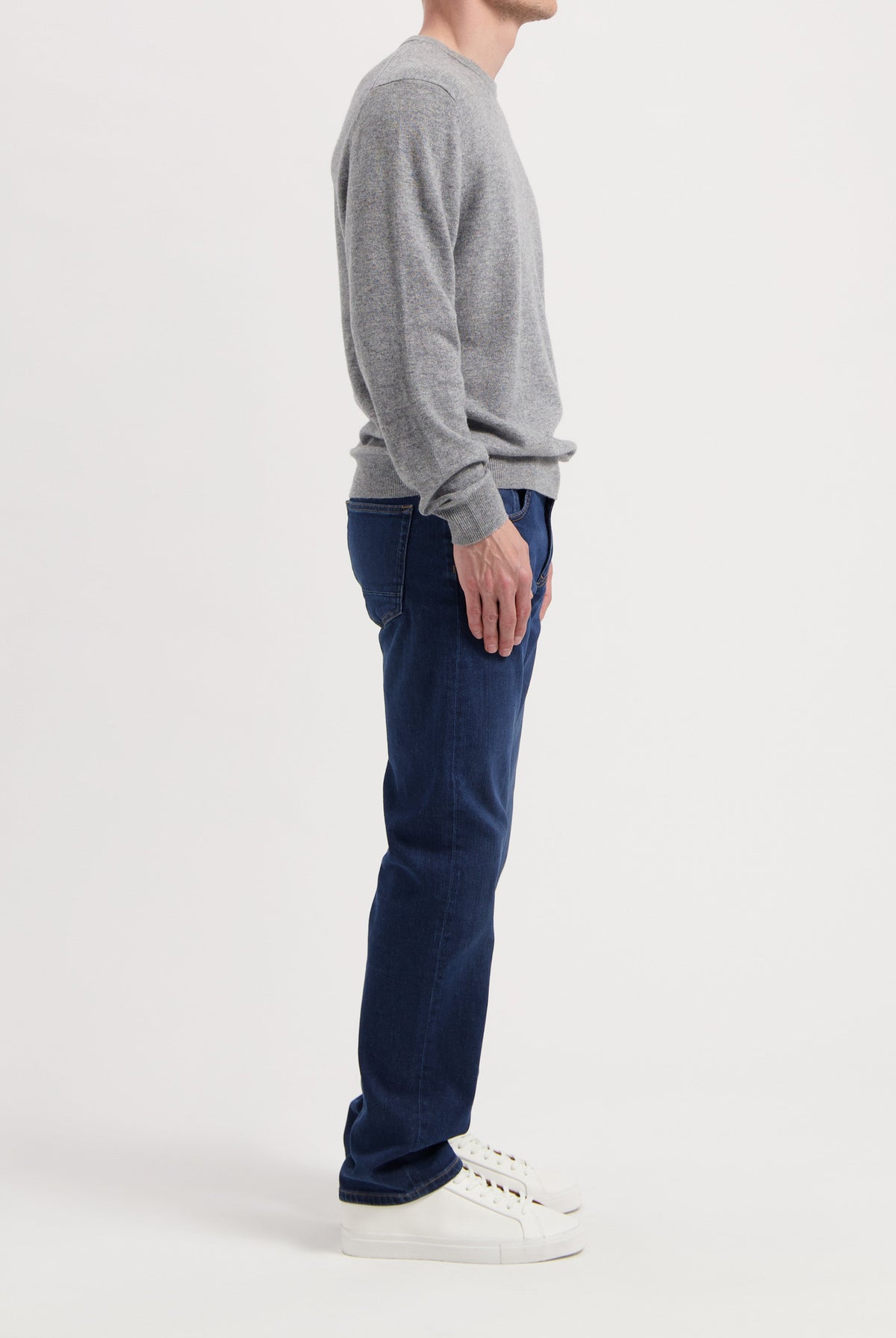 Sustainable MUD Jeans denim jacket in a classic blue, crafted from ethical materials, paired with matching jeans.