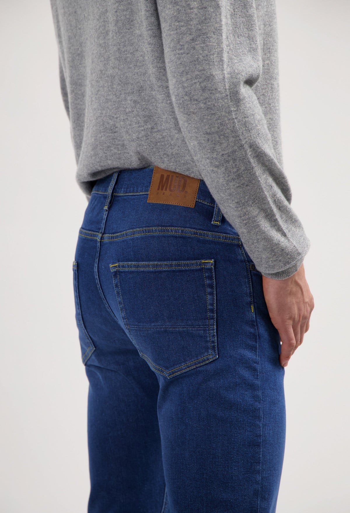 Sustainable MUD Jeans denim jacket made from ethical organic cotton, featuring classic blue wash and buttoned front.