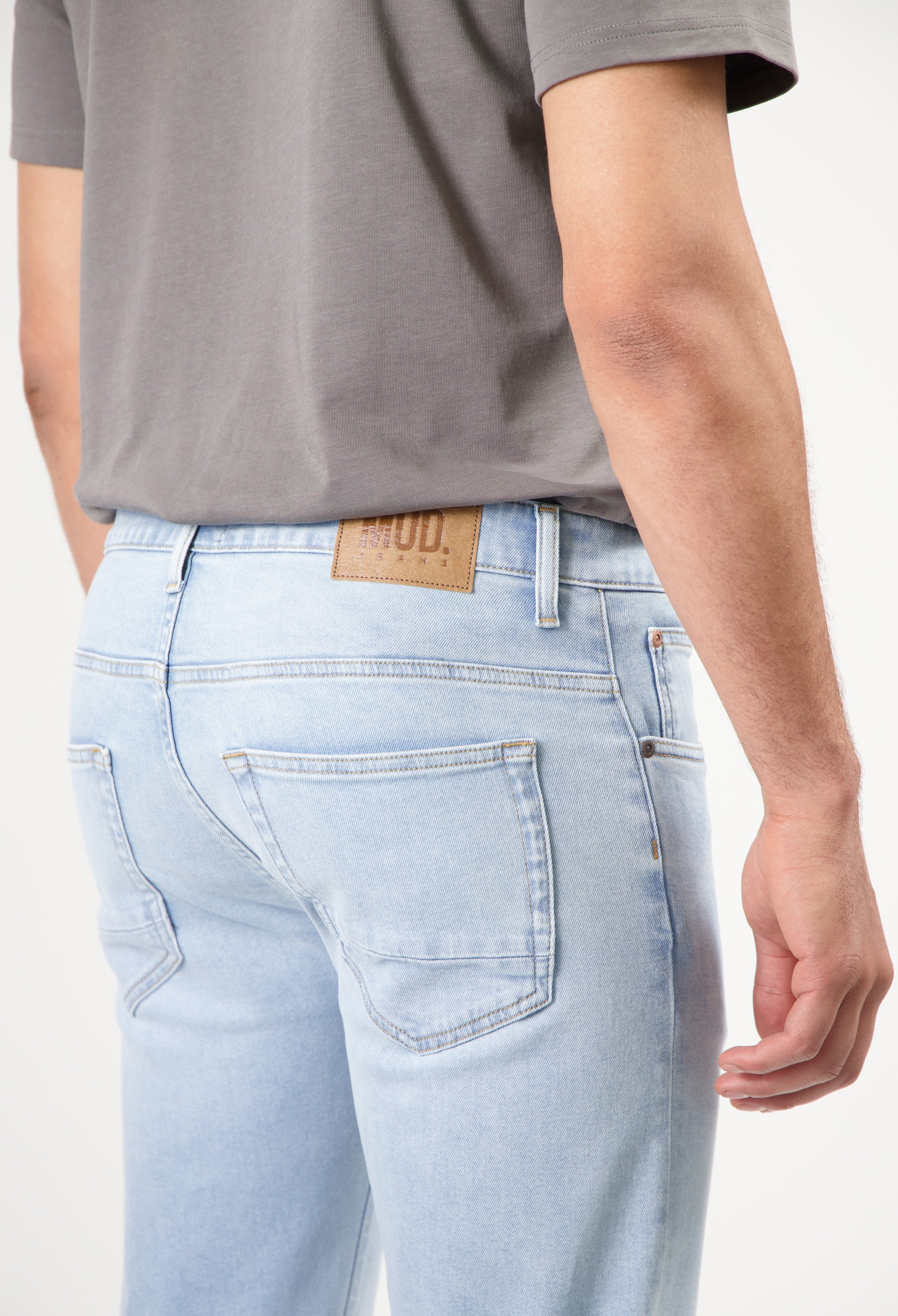 Sustainable MUD Jeans denim shorts in light blue, crafted from organic cotton for an eco-friendly and ethical style.