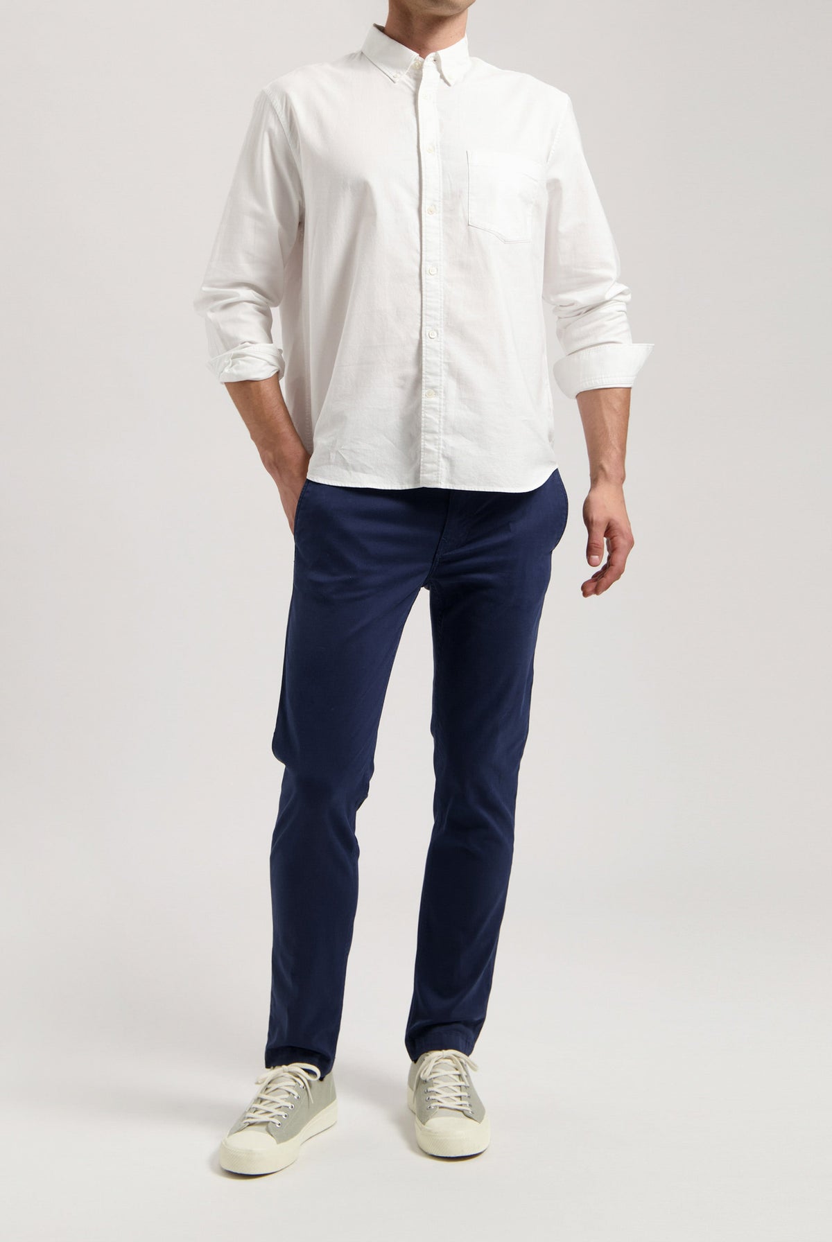 Sustainable MUD Jeans with classic blue denim, paired with a black t-shirt for an ethical, timeless style.