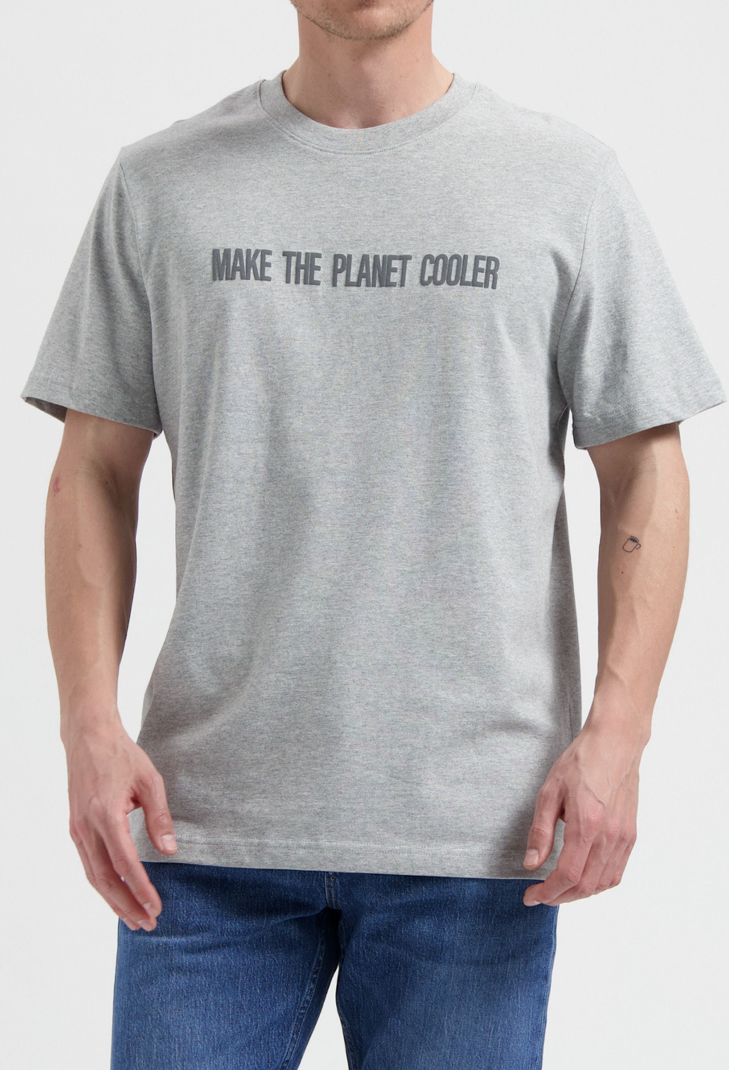 Gray cotton t-shirt with "Make the Planet Cooler" slogan, paired with classic blue denim jeans on a neutral background.
