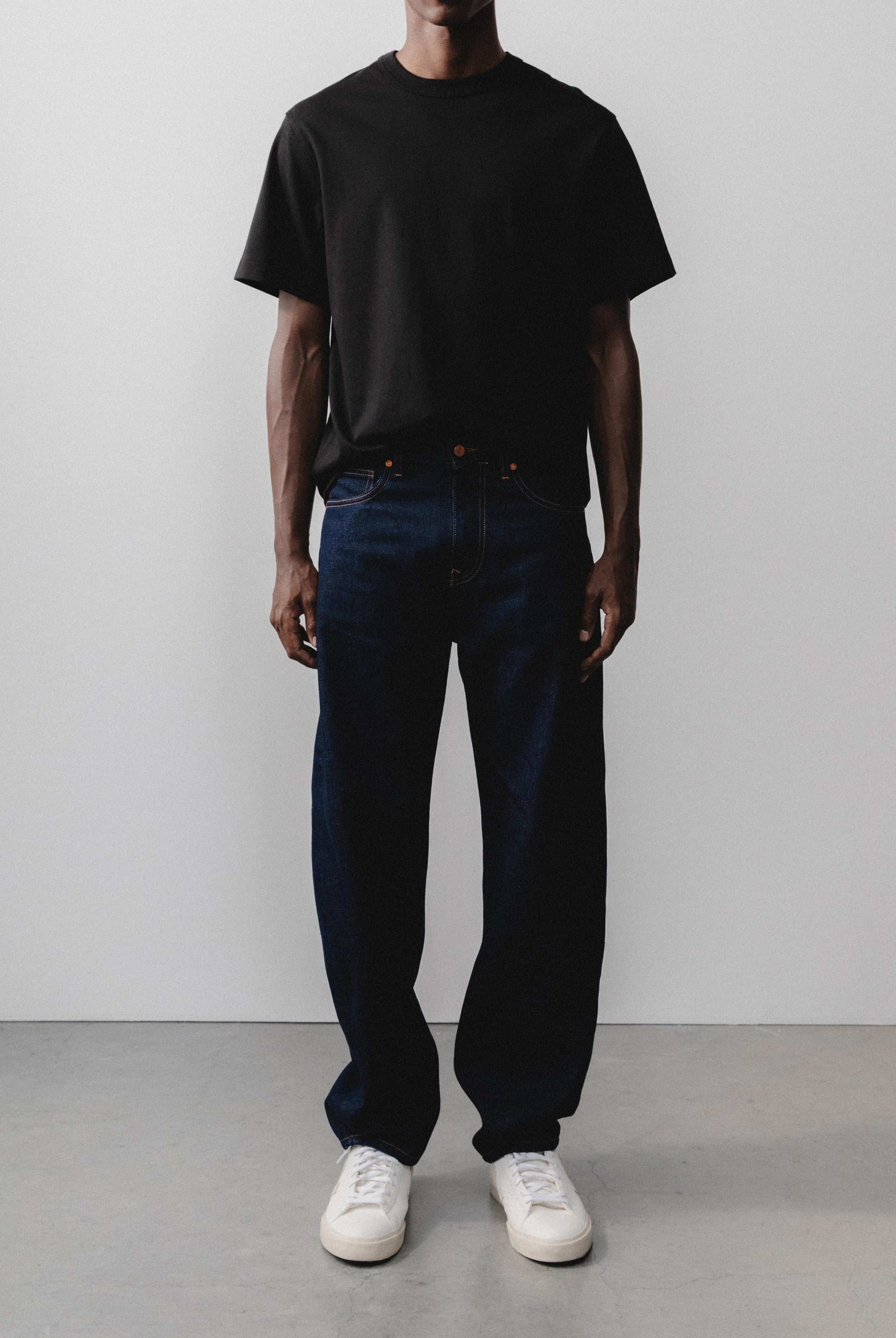 Sustainable MUD Jeans in light blue denim, crafted from organic cotton, showcasing ethical fashion and eco-friendly style.