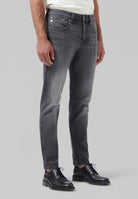 Sustainable MUD Jeans in light blue denim, crafted from organic cotton, showcasing a classic fit with ethical design.