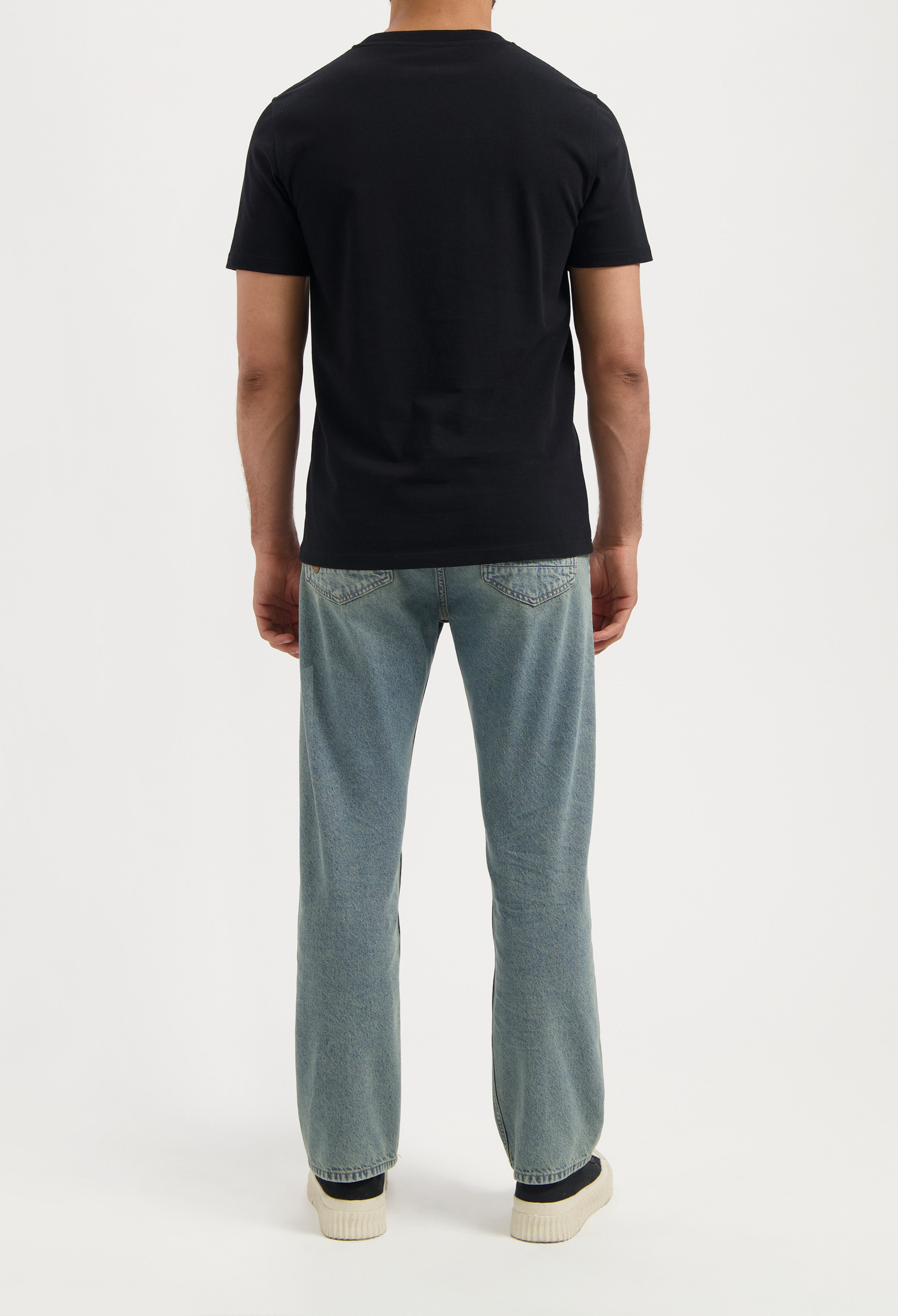 Sustainable MUD Jeans jacket in deep blue denim, highlighting ethical fashion with buttoned high collar and sleek design.