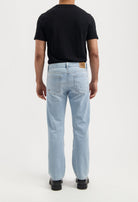 Sustainable MUD Jeans in black, made from organic cotton, featuring a sleek, ethical design in a slim fit.