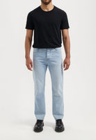 Sustainable MUD Jeans in black denim, highlighting a classic fit with ethical craftsmanship and eco-friendly materials.