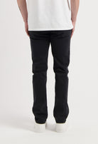 Sustainable MUD Jeans in a classic fit with light blue denim, emphasizing ethical fashion and eco-friendly materials.