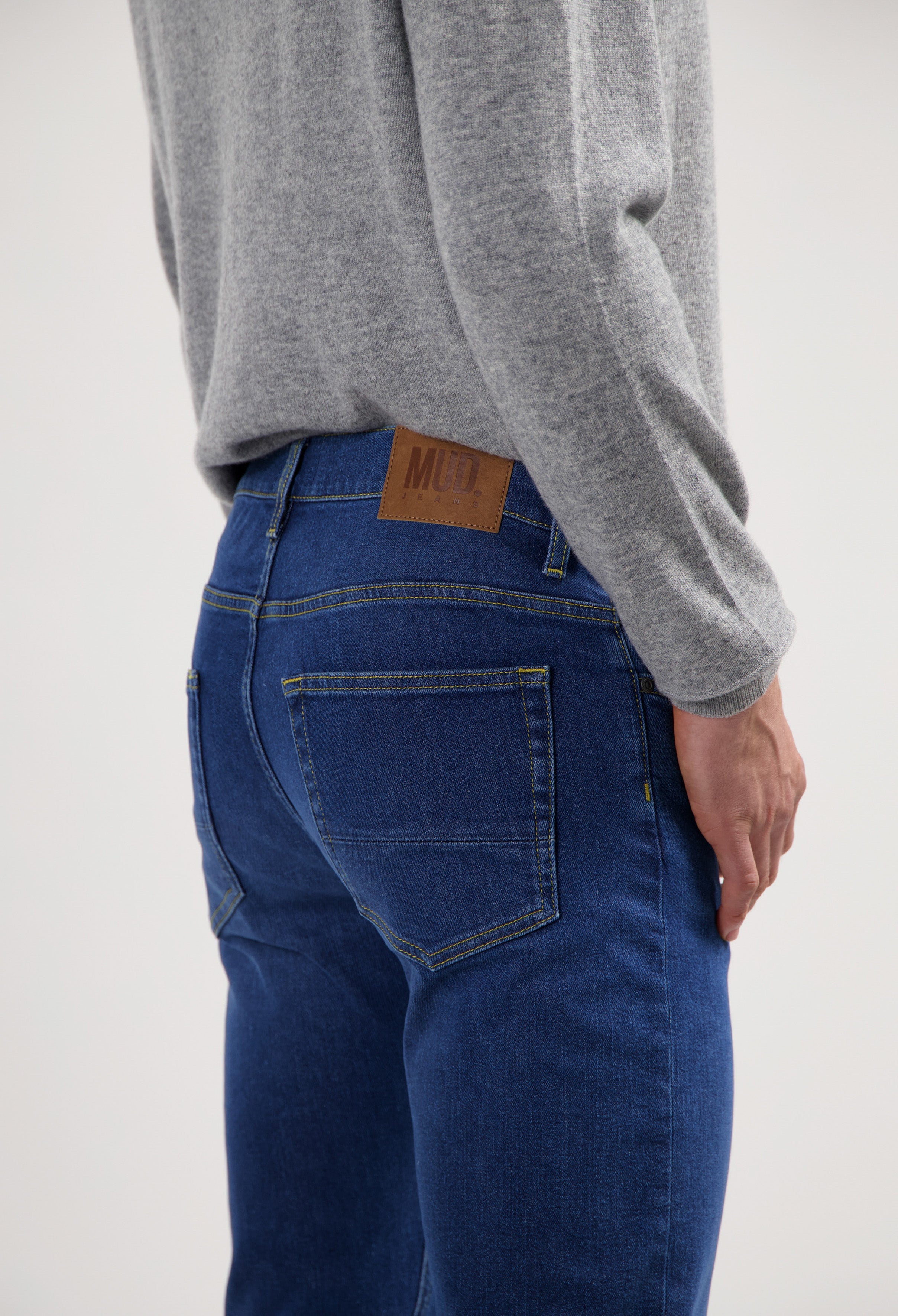 Sustainable MUD Jeans denim jacket made from ethical organic cotton, featuring classic blue wash and buttoned front.