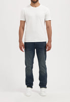 Sustainable MUD Jeans made from organic cotton, showcasing a classic fit in light blue denim for ethical fashion choices.